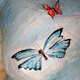 Pearl's belly cast butterfly detail.