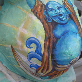 Belly Cast surfing Buddha detail.